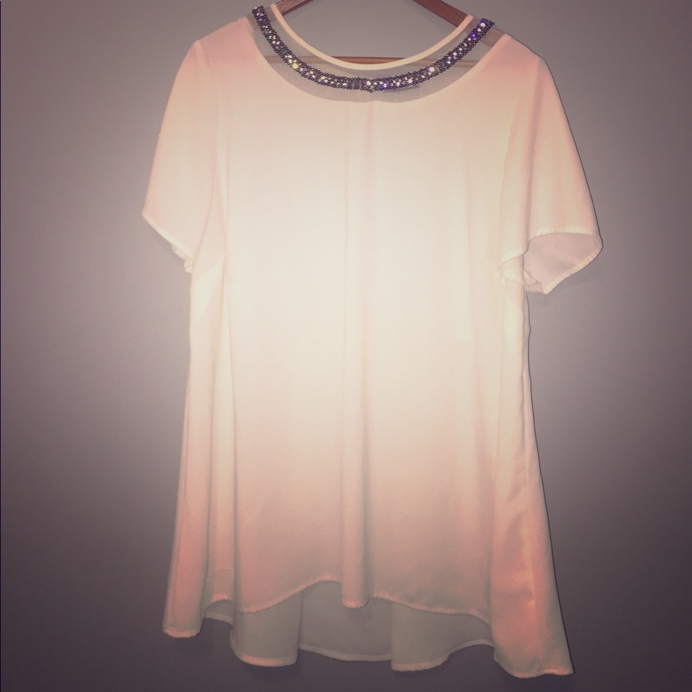 White top with beaded collar, peplum style
